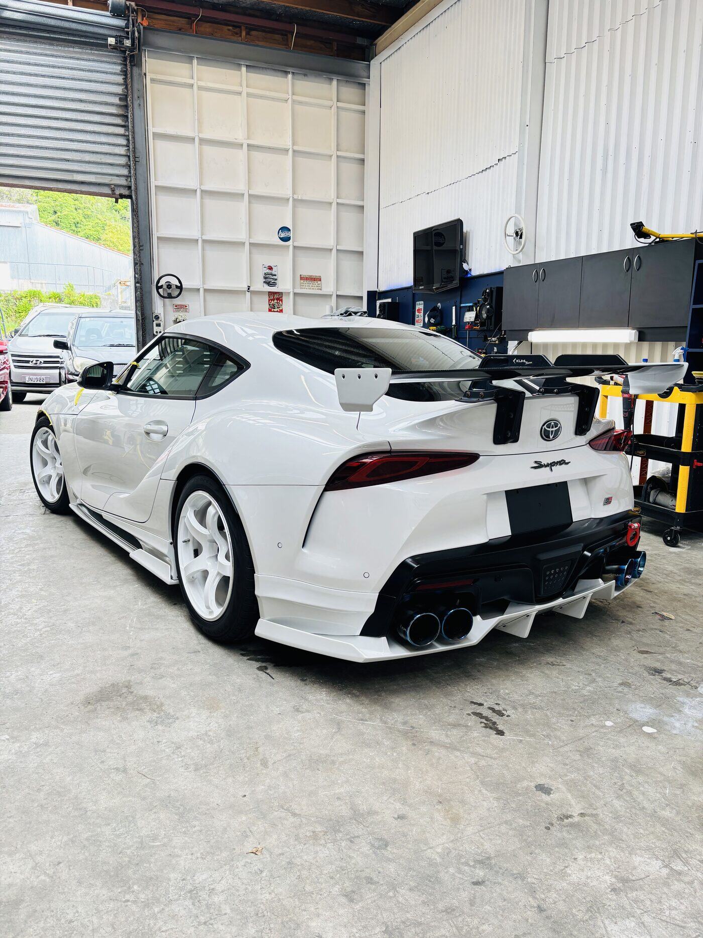 Rear three-quarter of a white Toyota Supra after paint protection at our Lower Hutt workshop